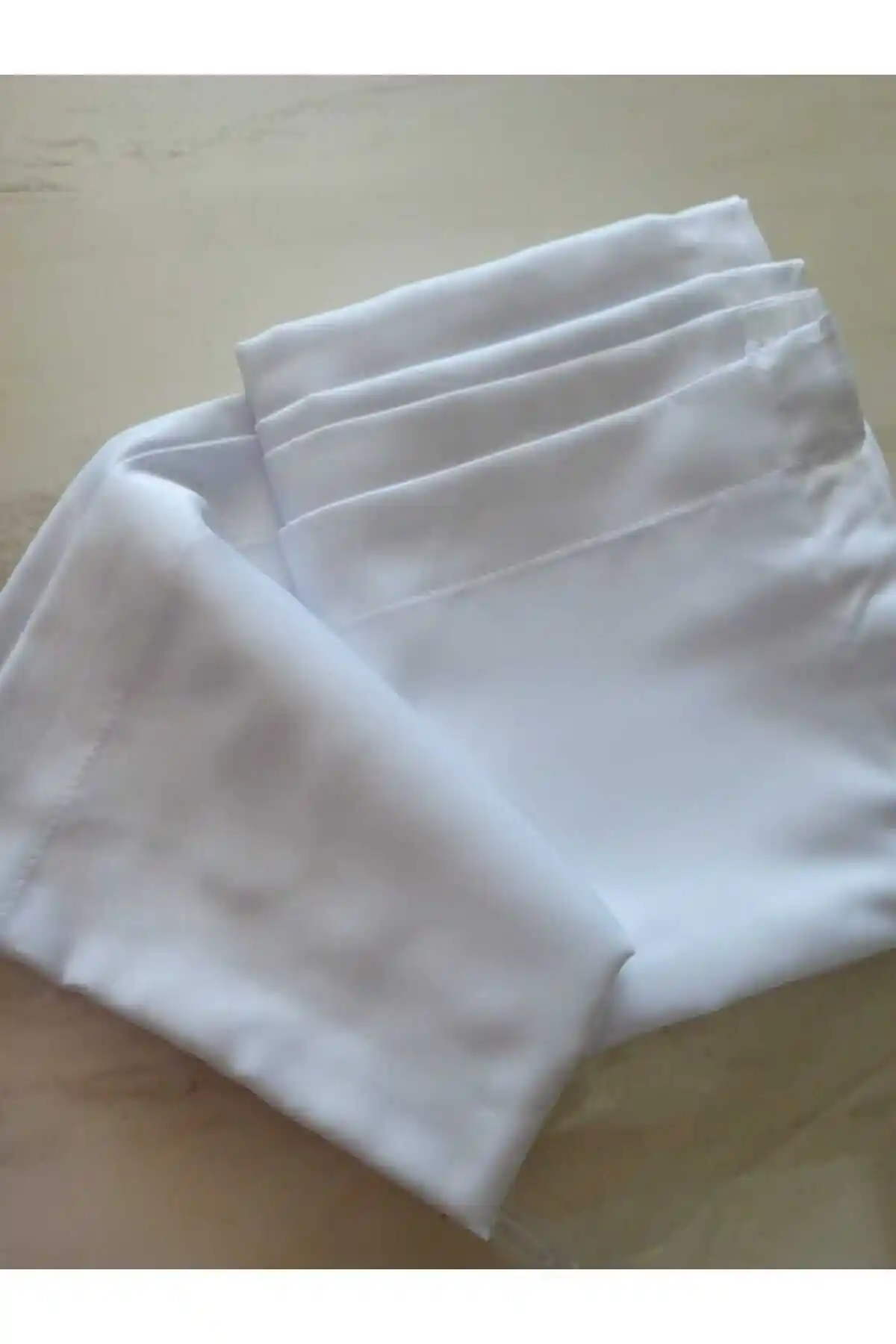 Elonyatekstil ve NEMARIK Beyaz Saten Güneşliklerin Karşılaştırması