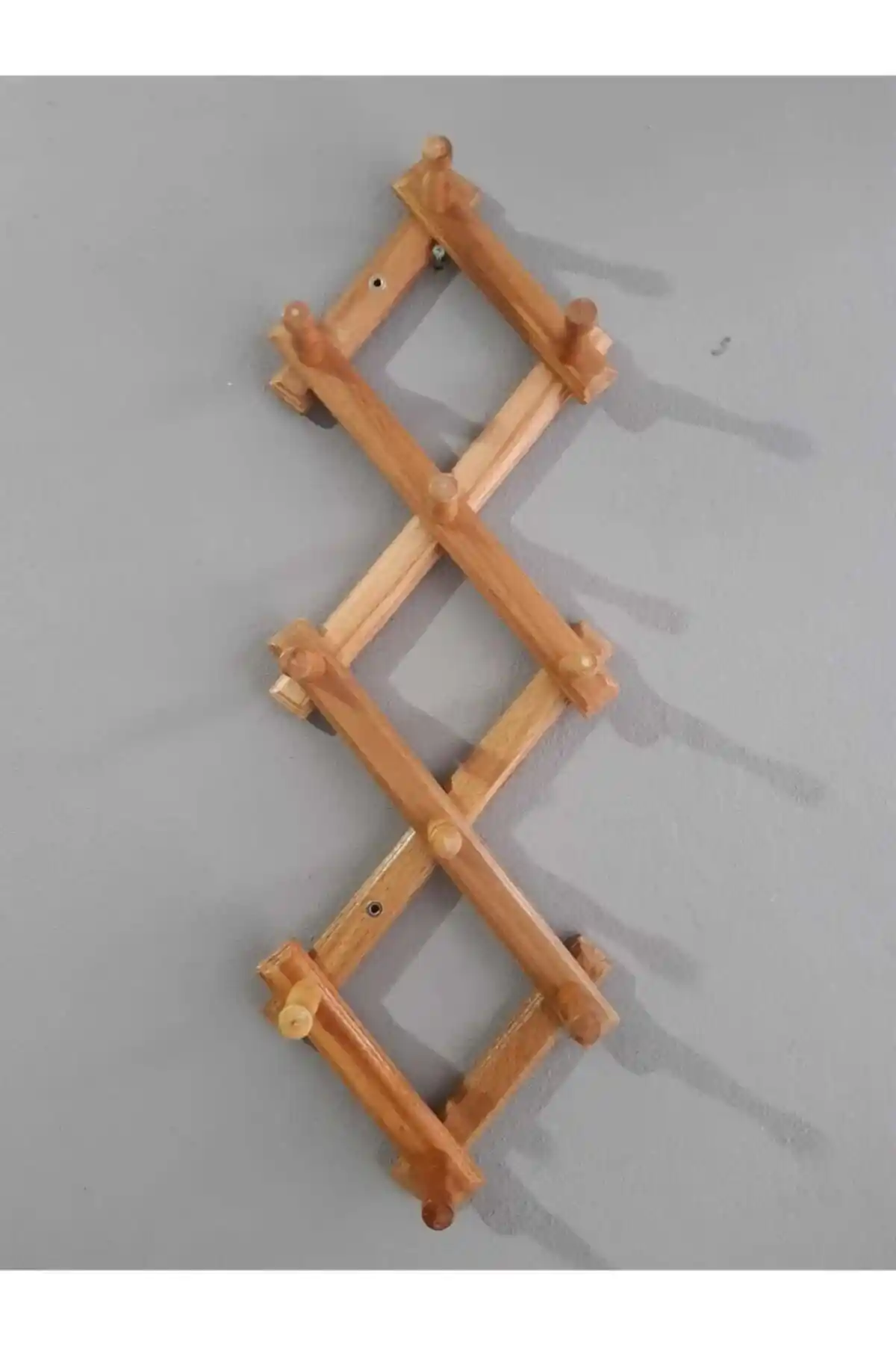 Genel Markalar Ahşap Duvar Askısı: Estetik ve Fonksiyonelliği Bir Arada Sunan Pratik Çözüm