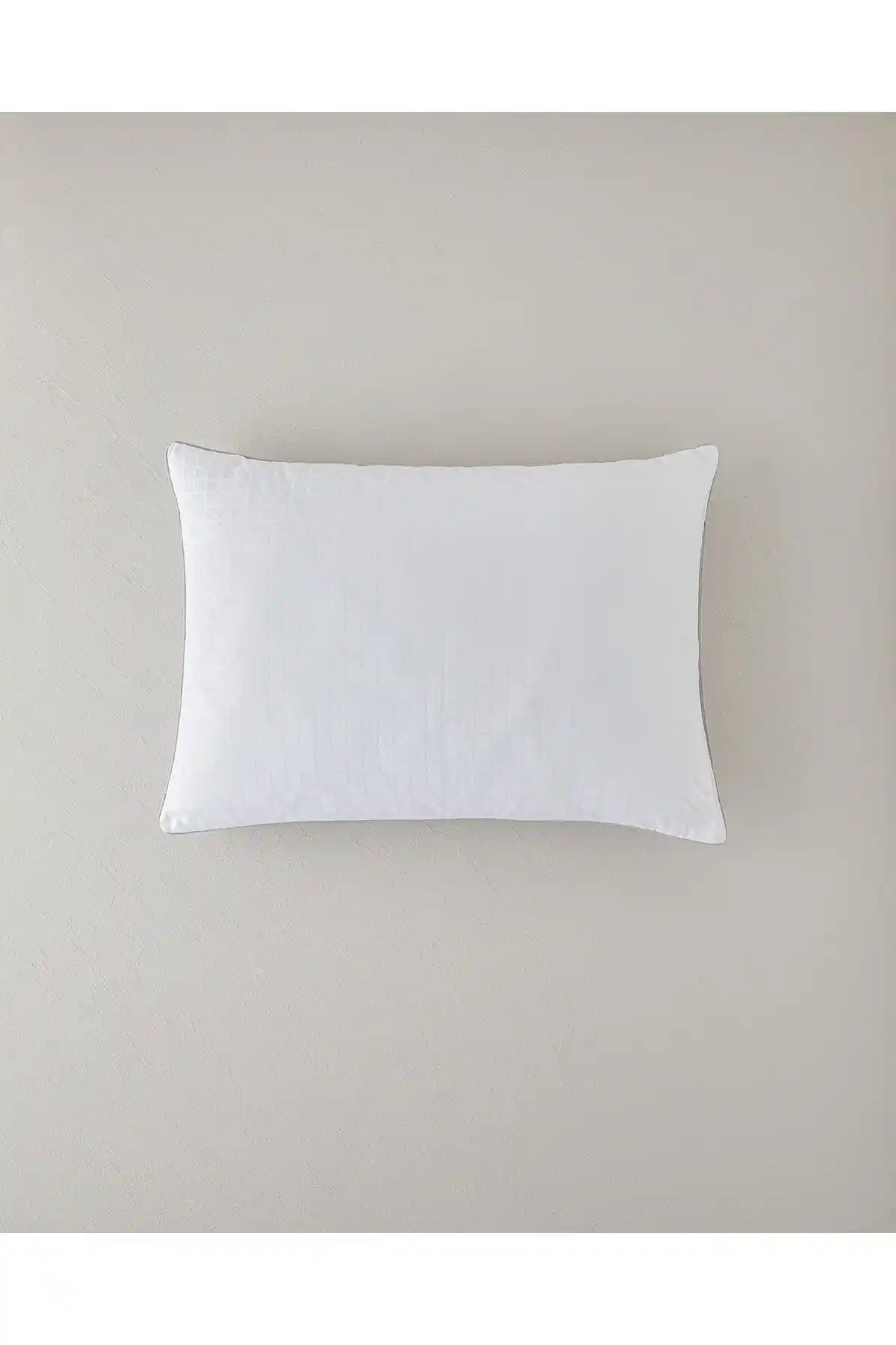 Türkçe’de Konfor ve Dayanıklılığı Sunan Aura Boncuk Elyaf Yastık Gri Renkli ve Pratik Kullanım Özellikleri