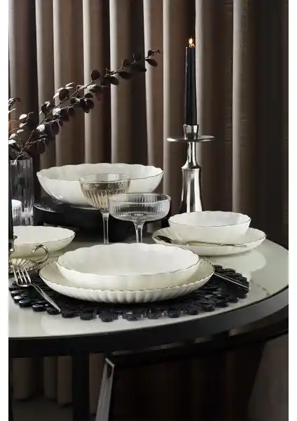 Kütahya Porselen Bone Luz Form 27 Parça Yemek Takımı Şık ve Zarif Tasarımıyla Sofralara Estetik Katıyor