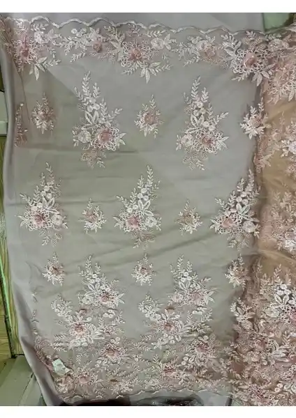 Dantel Kumaş: Zarif ve Çok Amaçlı Kullanım İçin Yüksek Kaliteli Nakışlı Kumaş