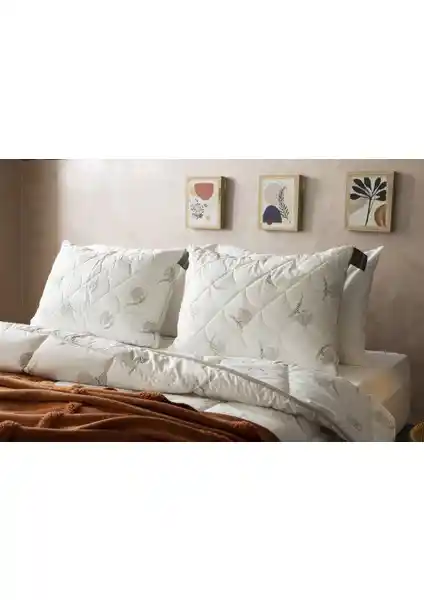 Duvetta Kapitone Yün Boncuk Yastık: Sağlıklı ve Ergonomik Uyku İçin Doğal Seçenek