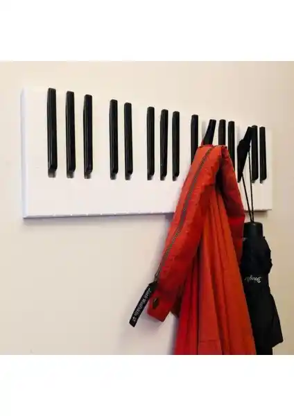 Mumaks Piyano Elbise Askılığı: Şık ve Çok Amaçlı Dekoratif Askı Çözümü