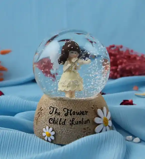 Çiçek Sepeti Kar Küresi: Dekorasyonda Şıklık ve Büyüleyici Detaylar