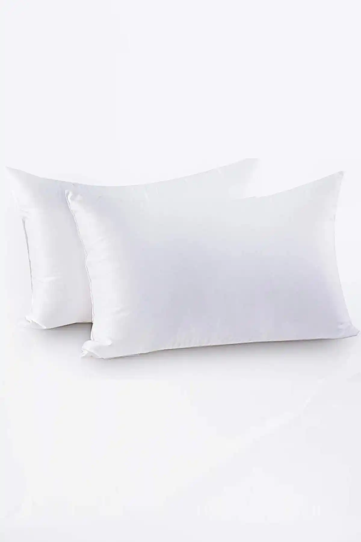 Dekorasyon ve Konforun Şıklıkla Buluşması: 2’li Yastıklar ile Mekânlarınızı Yenileyin