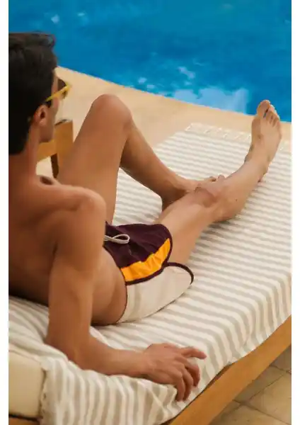 Green Petition Mare ve Ocean Reef Flame: Doğa Dostu Geri Dönüştürülmüş Plaj Havluları Karşılaştırması