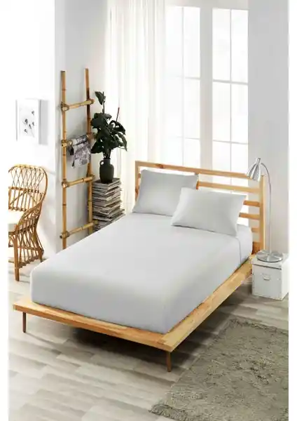 Ely Parker Lastikli Çarşaf Takımı: Konfor ve Şıklığı Bir Arada Sunan Yatak Örtüsü