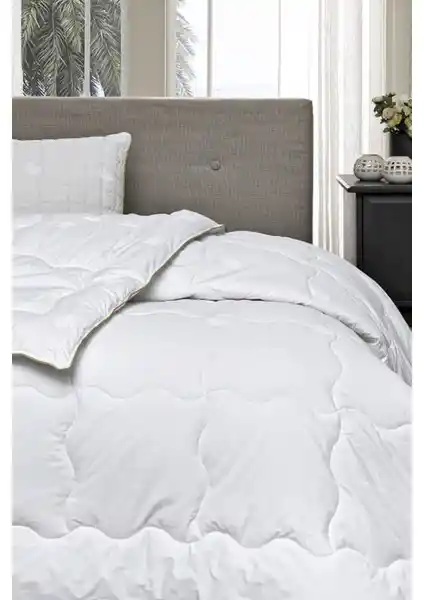 Özdilek Çift Kişilik Yün Yorgan 195x215: Doğal Malzemelerle Konforlu Uyku Deneyimi