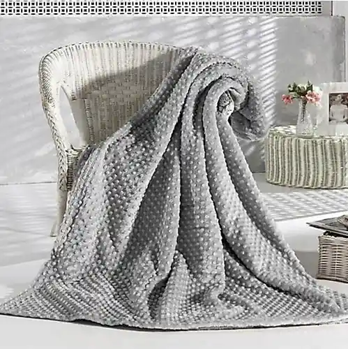 Merinos Tomurcuk Battaniye ile Dekorasyonda Şıklık ve Konforun Buluşması