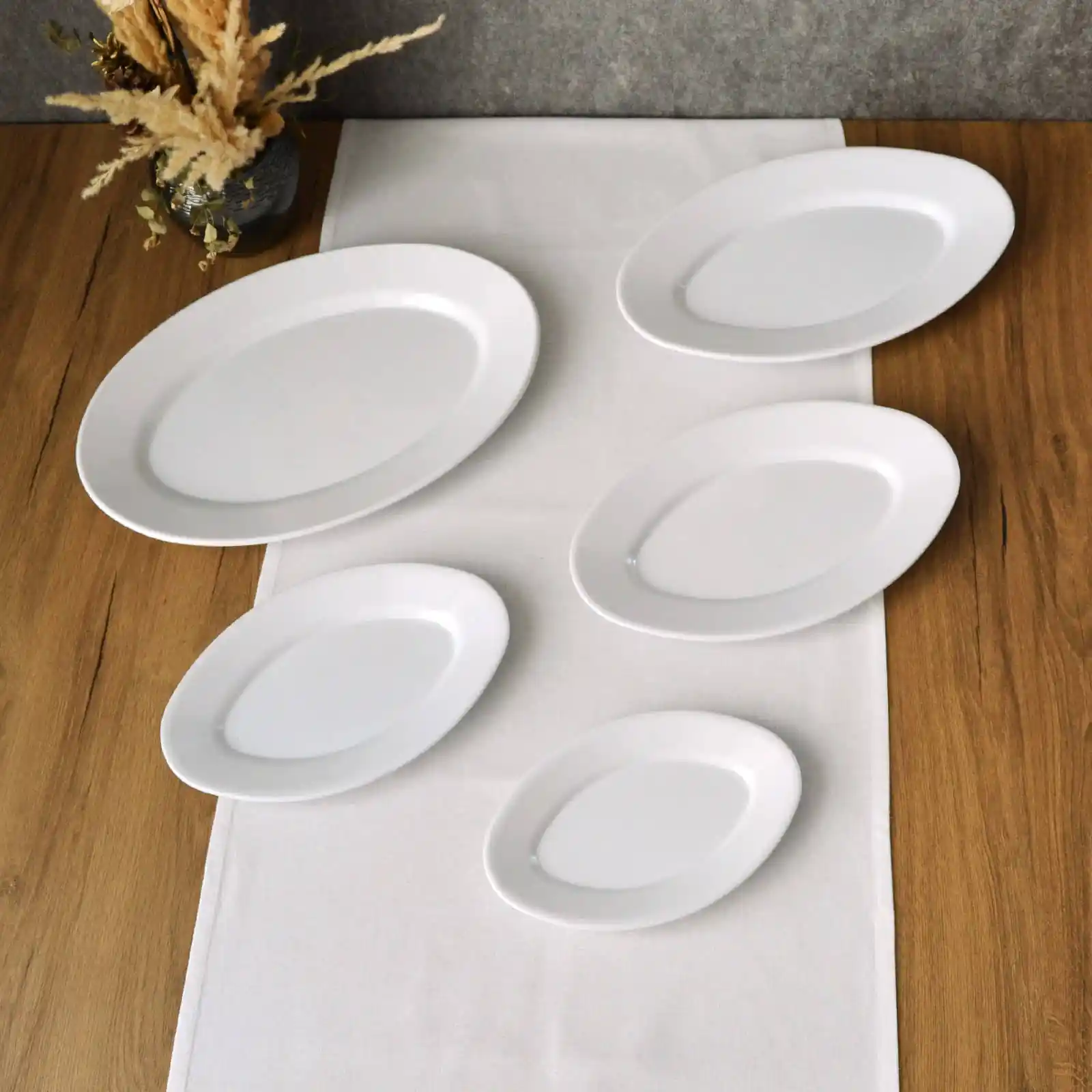 Melamin Kayık Tabaklar: Estetik ve Fonksiyonelliği Bir Arada Sunan Dekoratif Ürünler