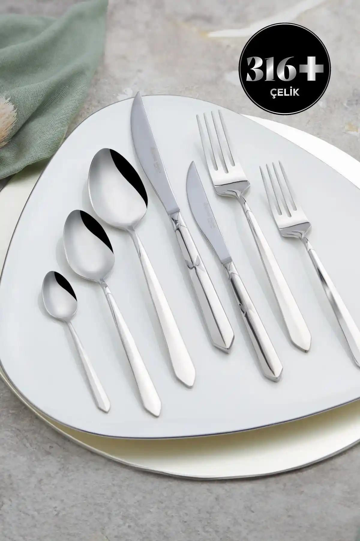 Mutfak Dekorasyonunda Çelik Çatal Bıçak Takımlarının Estetik ve Fonksiyonel Rolü (75-90 karakter)