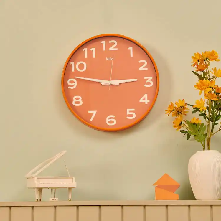 Turuncu Duvar Saati ile Mekanlarınızı Canlandırmanın Yolları ve Dekorasyon İpuçları