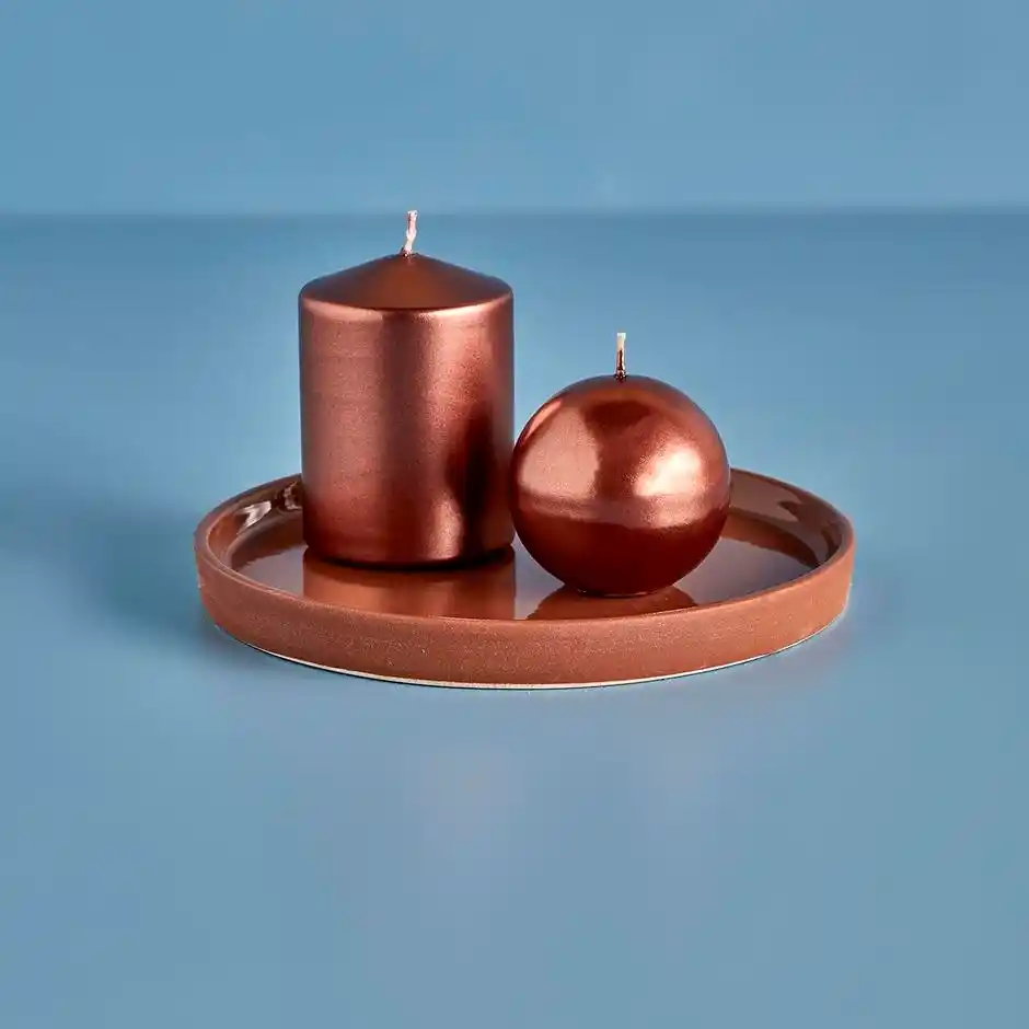 Yuvarlak Mumlarla Dekorasyonda Şıklık ve Sıcaklık Yaratmanın Yolları