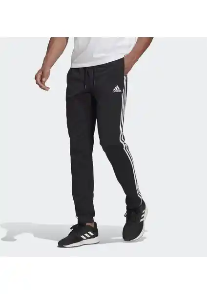 Adidas GK8995 Essentials Pantolon: Konfor ve Şıklığı Bir Arada Sunan Günlük Spor Giyim Parçası
